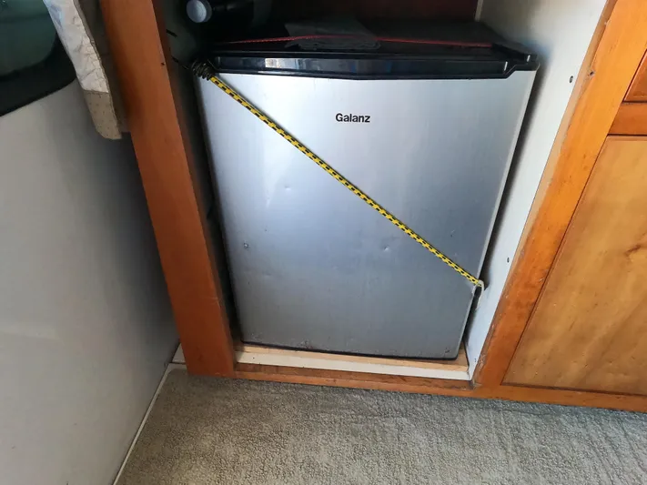  Yacht Photos Pics Mini fridge in 2002 Luhrs 34 Convertible boat kitchen.