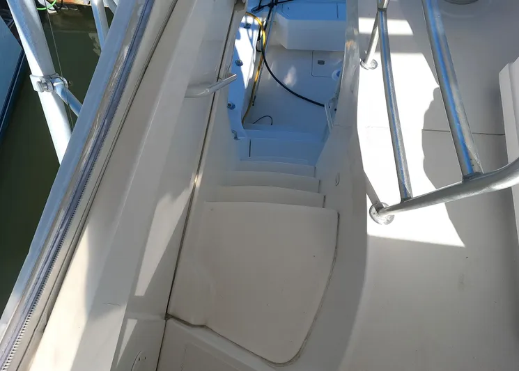  Yacht Photos Pics 2002 Luhrs 34 Convertible boat stairs and deck area.