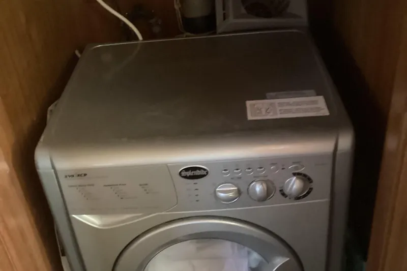 No Reservations Yacht Photos Pics Compact washing machine inside a 1984 Spindrift 52 Motor Yacht.