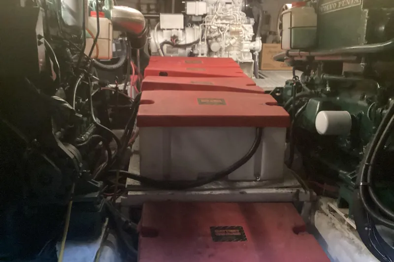 No Reservations Yacht Photos Pics Engine room of 1984 Spindrift 52 Motor Yacht with visible machinery and components.