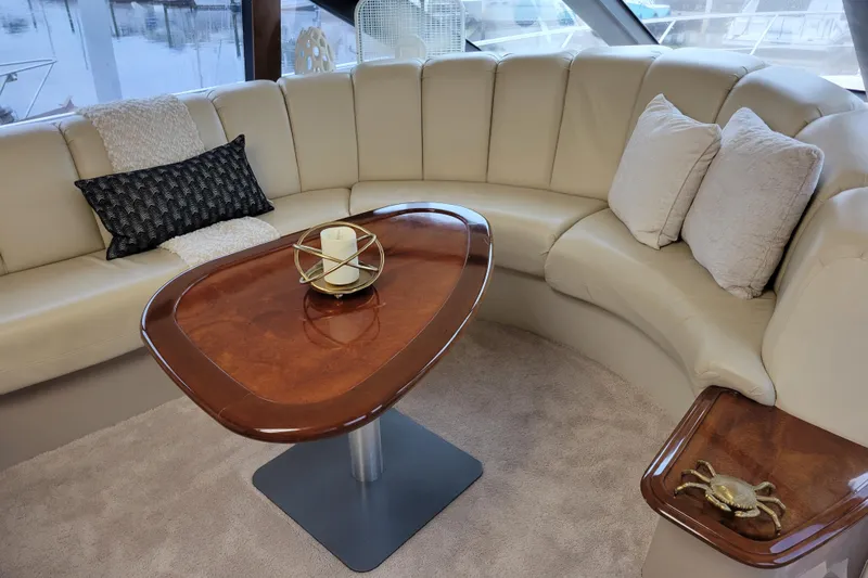  Yacht Photos Pics Luxurious interior of 2007 Carver 56 Voyager SE yacht with plush seating and elegant decor.