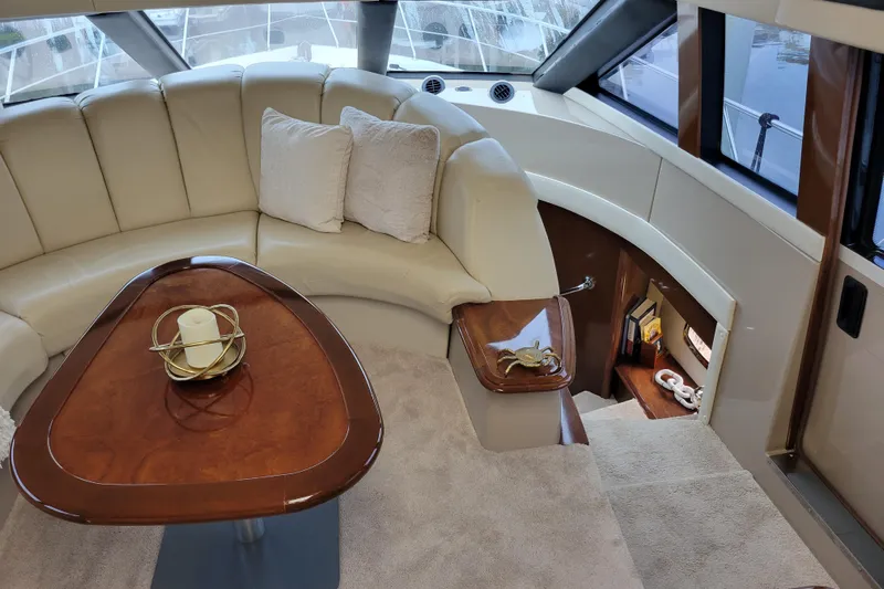  Yacht Photos Pics Luxurious interior of 2007 Carver 56 Voyager SE yacht with plush seating and elegant decor.