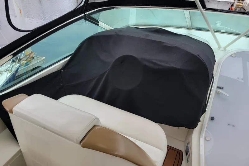  Yacht Photos Pics 2007 Carver 56 Voyager SE helm area with covered controls and seating.