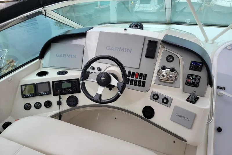  Yacht Photos Pics 2007 Carver 56 Voyager SE helm with Garmin navigation and control systems.