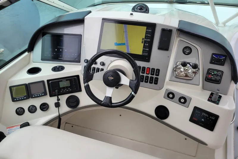  Yacht Photos Pics 2007 Carver 56 Voyager SE helm with advanced navigation and control systems.