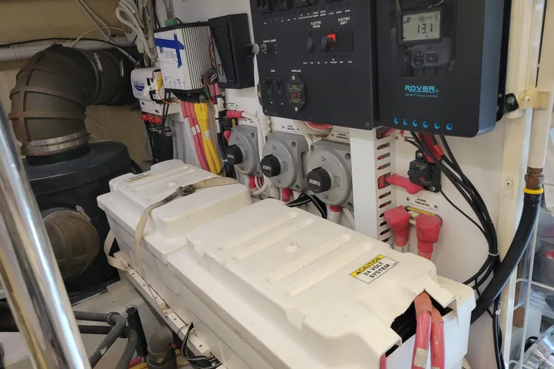  Yacht Photos Pics Engine room of a 2007 Carver 56 Voyager SE with electrical components and wiring.