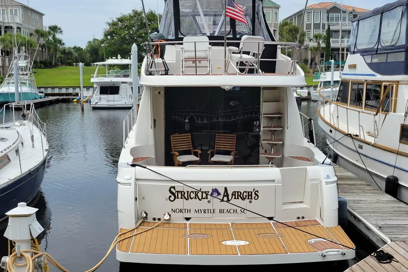  Yacht Photos Pics 2007 Carver 56 Voyager SE yacht docked at marina, North Myrtle Beach, SC.