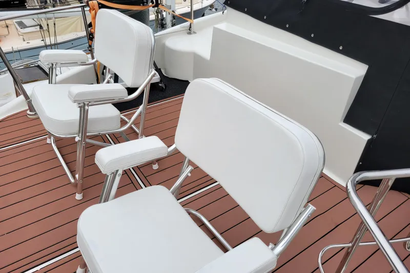  Yacht Photos Pics White chairs on the deck of a 2007 Carver 56 Voyager SE yacht.