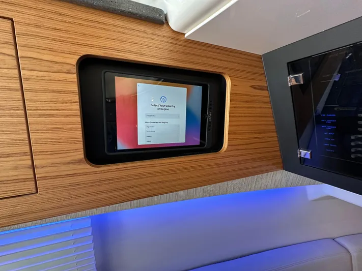 Hightide Yacht Photos Pics 2022 Boston Whaler 380 Realm interior with touchscreen control panel.