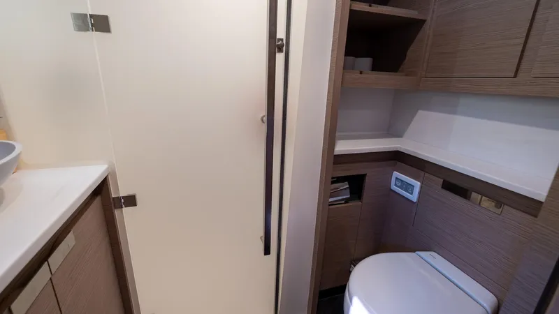  Yacht Photos Pics Modern bathroom interior on 2023 Fountaine Pajot Catamaran Alegria 67 yacht.