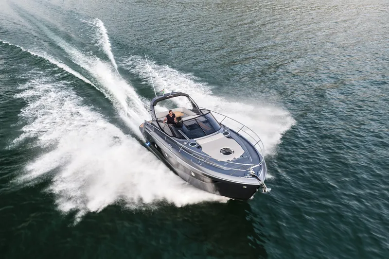 Yacht Photos Pics 2025 Cranchi Z35 yacht cruising swiftly on open water.