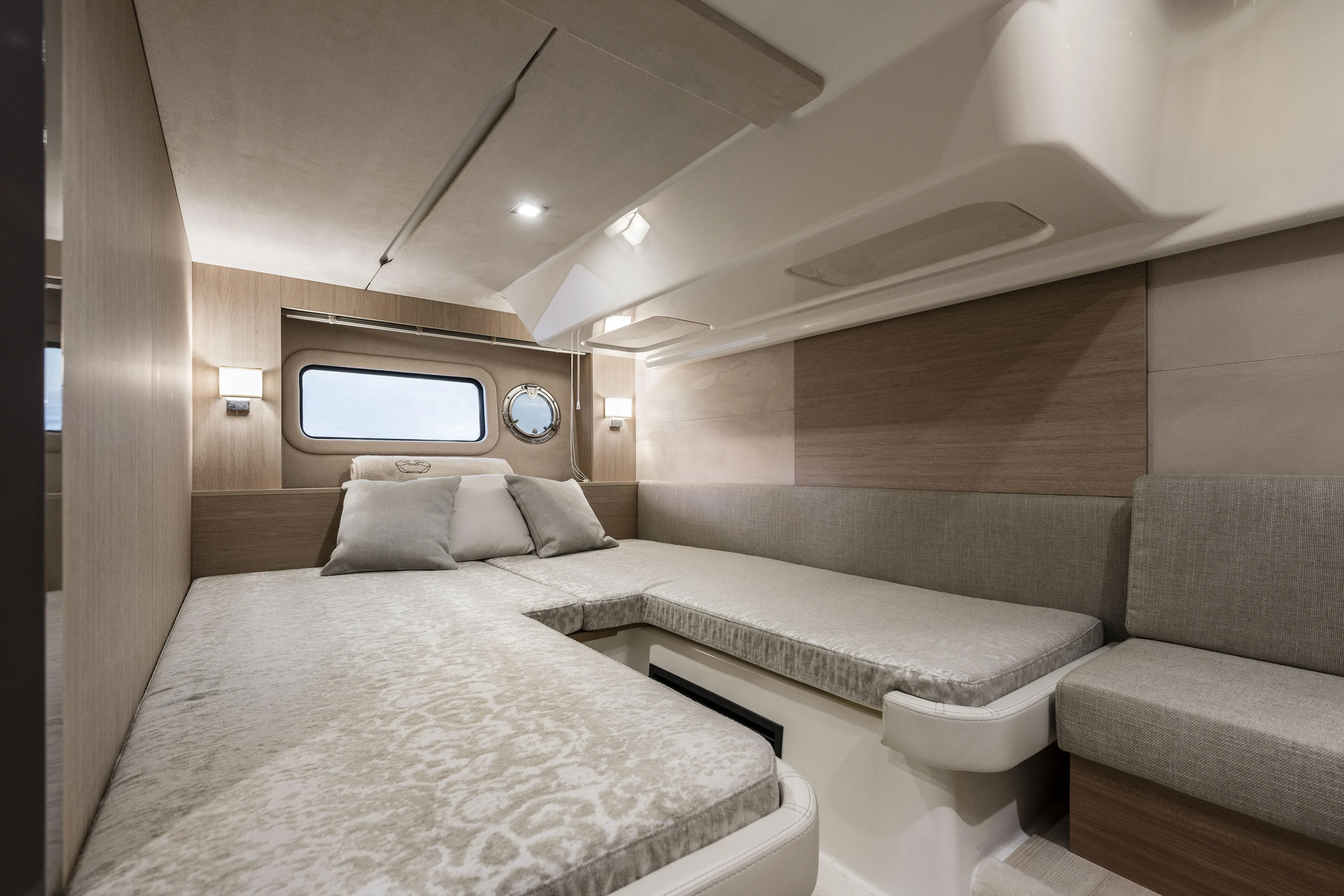  Yacht Photos Pics Luxurious interior of 2025 Cranchi Z35 yacht with elegant bedding and modern design.