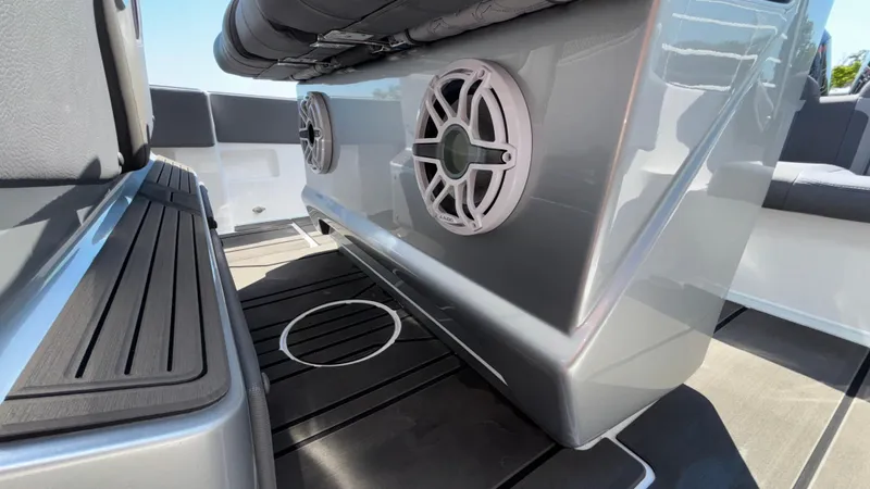  Yacht Photos Pics 2025 Fountain 34 SC boat interior with sleek seating and built-in speakers.