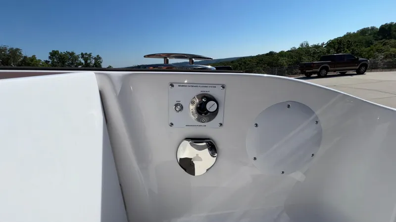  Yacht Photos Pics 2025 Fountain 34 SC boat dashboard with control panel and scenic background.