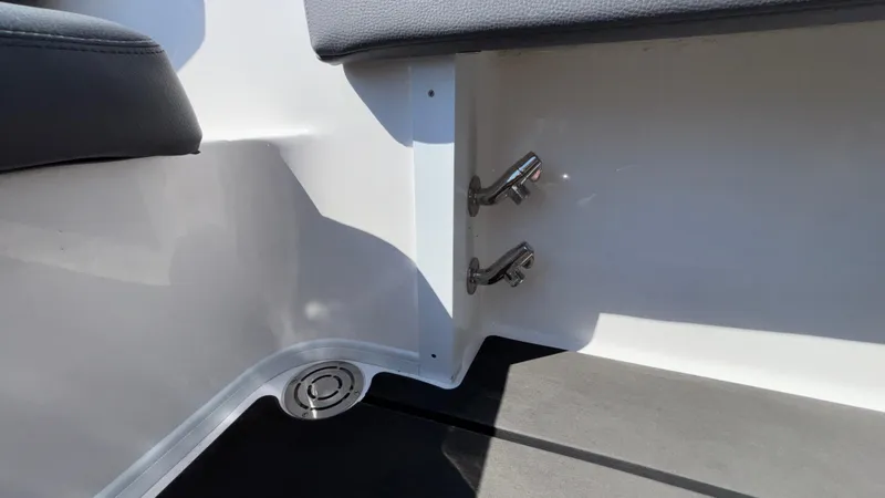  Yacht Photos Pics Interior detail of 2025 Fountain 34 SC boat, featuring sleek fixtures and seating.