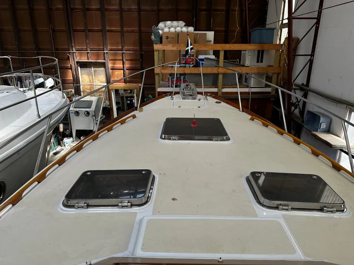  Yacht Photos Pics 1990 Little Harbor Express 36 yacht in storage, showcasing deck and hatches.