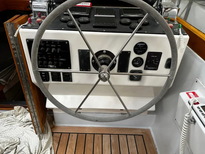  Yacht Photos Pics Helm of 1990 Little Harbor Express 36 with steering wheel and control panel.