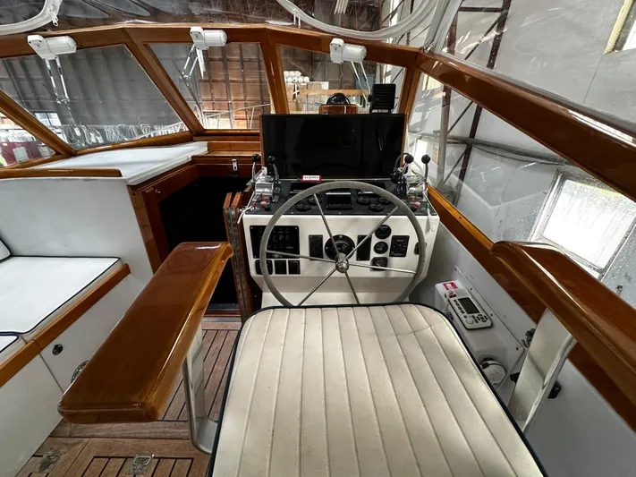  Yacht Photos Pics Cockpit of 1990 Little Harbor Express 36 with steering wheel and control panel.