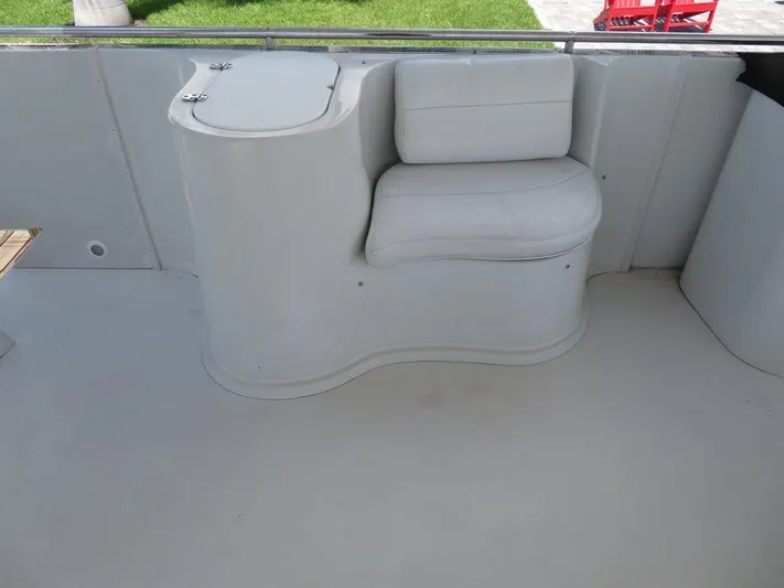  Yacht Photos Pics Bluewater Yachts Millennium Series 63, 2000 model, featuring a sleek white seating area.