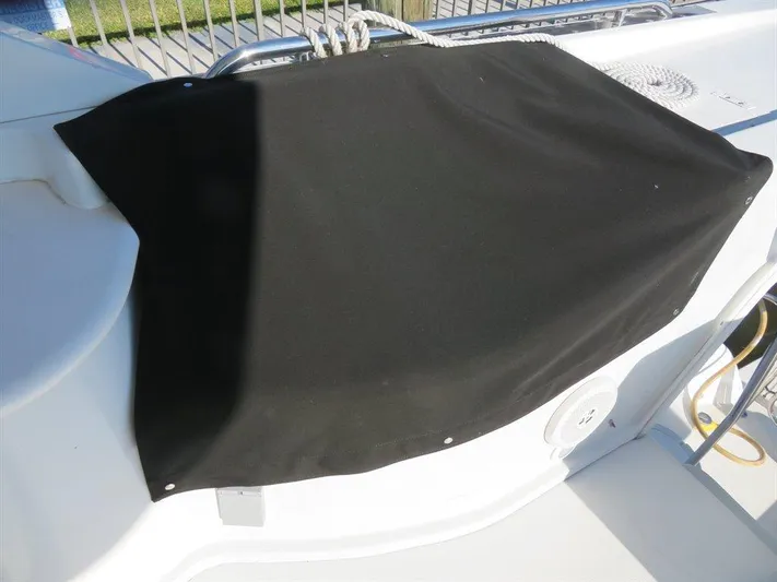  Yacht Photos Pics Black cover on Bluewater Yachts Millennium Series 63, 2000 model deck.