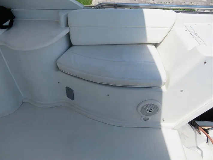  Yacht Photos Pics White seating area on 2000 Bluewater Yachts Millennium Series 63 boat deck.