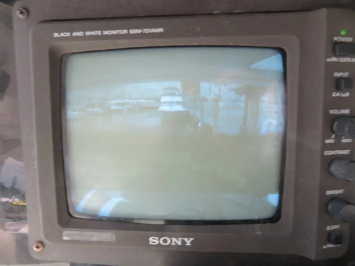  Yacht Photos Pics Sony black and white monitor displaying a marina view, associated with Bluewater Yachts Millennium Series 63.