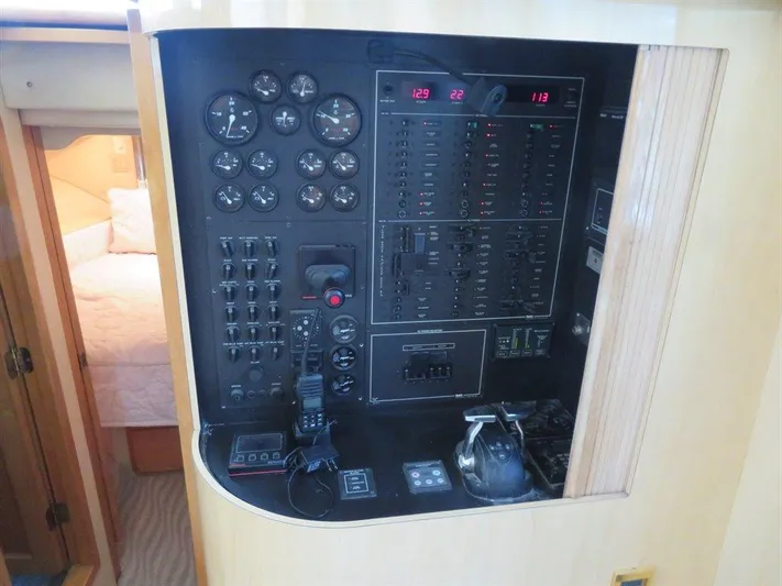  Yacht Photos Pics Control panel of a 2000 Bluewater Yachts Millennium Series 63, featuring gauges and switches.