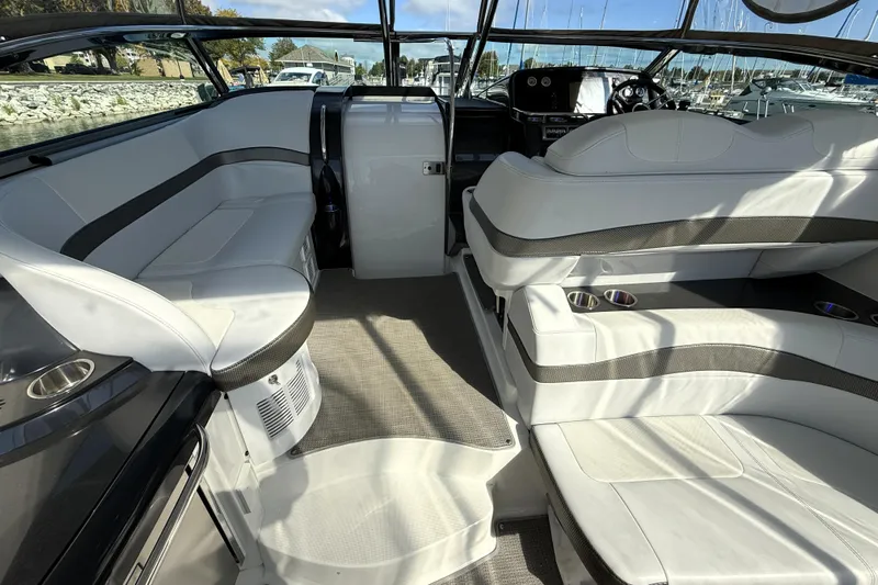 Knot To Scale Yacht Photos Pics 2018 Formula 37 Performance Cruiser interior with white seating and modern dashboard.