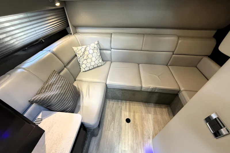 Knot To Scale Yacht Photos Pics Luxurious interior of 2018 Formula 37 Performance Cruiser with plush seating and modern decor.