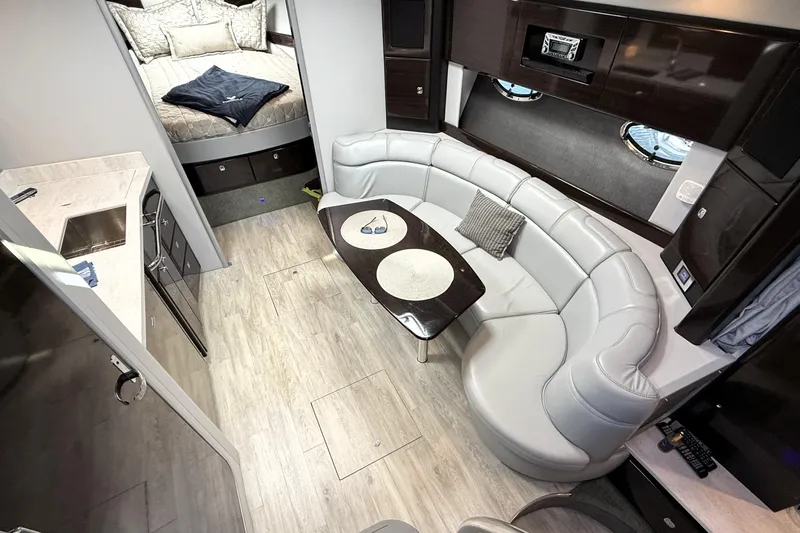 Knot To Scale Yacht Photos Pics 2018 Formula 37 Performance Cruiser interior with modern seating and cozy bedroom.
