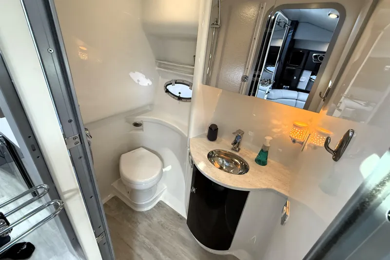 Knot To Scale Yacht Photos Pics 2018 Formula 37 Performance Cruiser bathroom with modern fixtures and compact design.