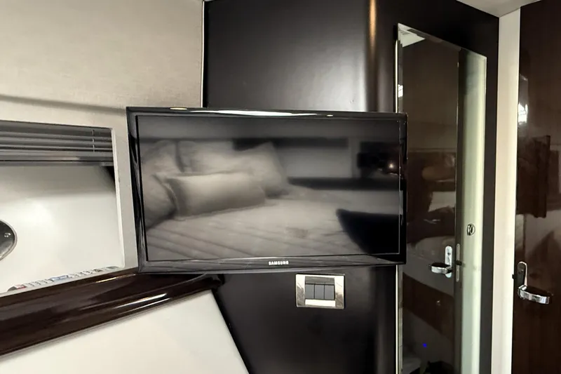 Knot To Scale Yacht Photos Pics Interior of 2018 Formula 37 Performance Cruiser with wall-mounted Samsung TV.