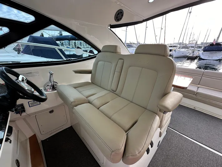 Divine Intervention Yacht Photos Pics Luxurious interior of 2015 Sea Ray 410 Sundancer yacht with plush seating.