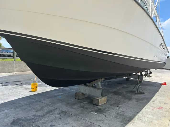 Ironman Yacht Photos Pics 2006 Rampage EXPRESS boat on dry dock, hull maintenance underway.