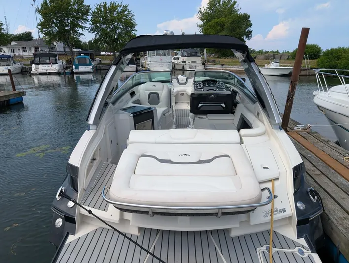  Yacht Photos Pics 2011 Monterey 328 SS boat docked at marina, featuring spacious seating and modern design.