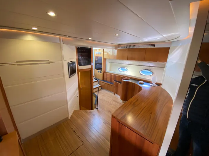 Uml Yacht Photos Pics Luxurious interior of a 2007 Pershing 62' yacht with modern wood finishes.