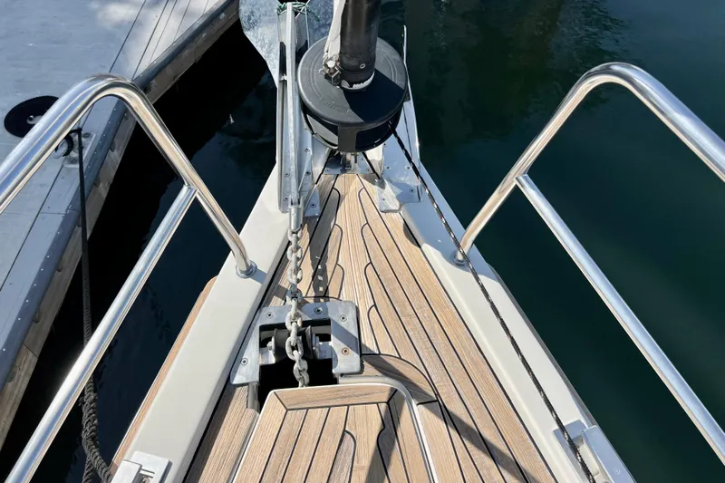 The Jonathan Shepard Yacht Photos Pics Bow of 2006 Hanse 461e yacht with anchor chain and teak decking.