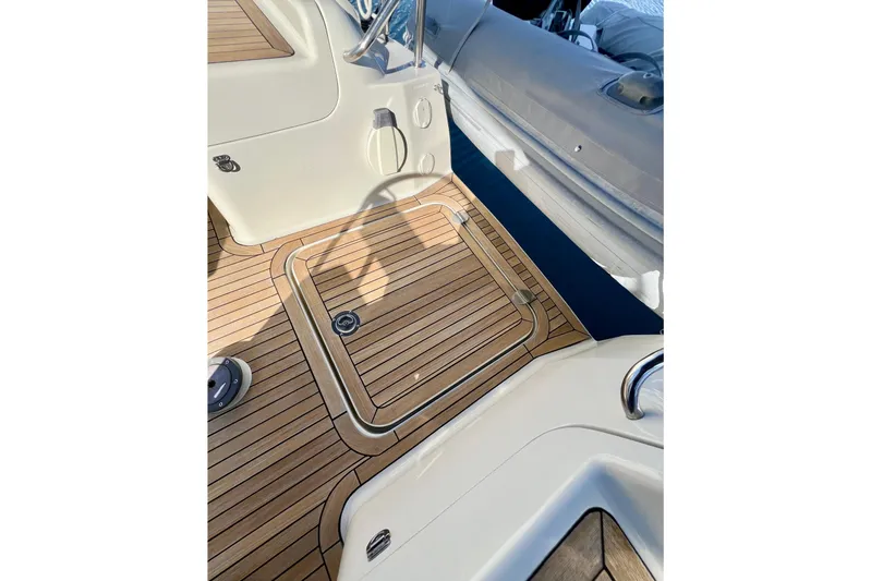 The Jonathan Shepard Yacht Photos Pics Teak deck of 2006 Hanse 461e yacht, featuring sleek design and modern fittings.