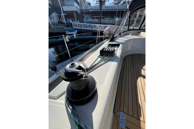 The Jonathan Shepard Yacht Photos Pics Deck view of 2006 Hanse 461e yacht, featuring winch and teak flooring.