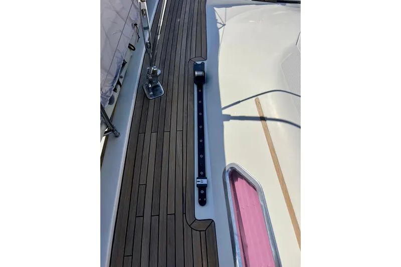 The Jonathan Shepard Yacht Photos Pics Deck of 2006 Hanse 461e sailboat with teak flooring and hardware.