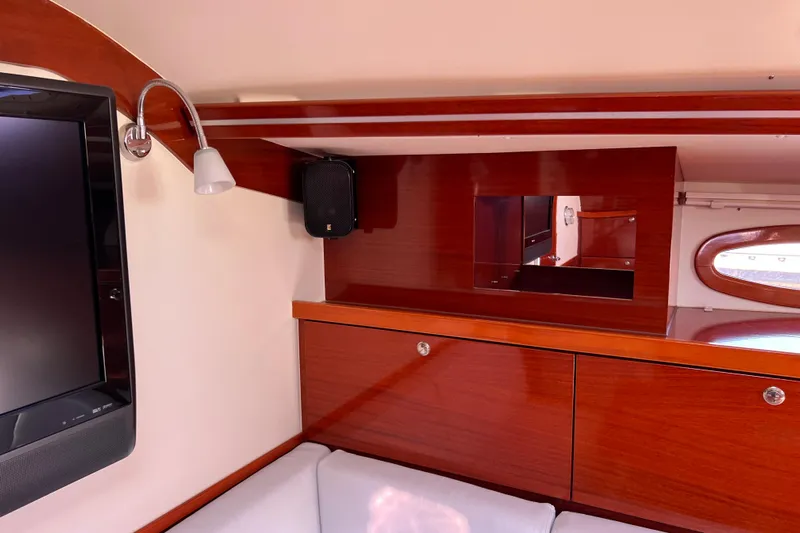 The Jonathan Shepard Yacht Photos Pics Interior of 2006 Hanse 461e yacht with wooden cabinetry and modern lighting.