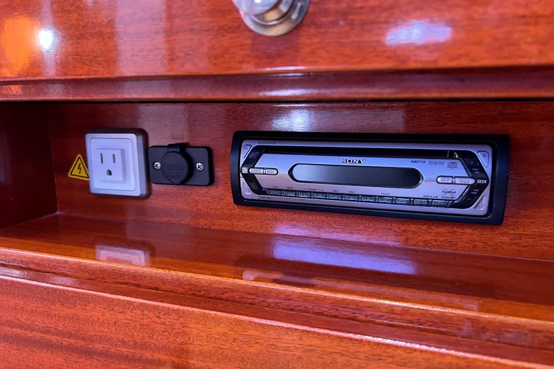 The Jonathan Shepard Yacht Photos Pics Wooden interior of 2006 Hanse 461e with Sony stereo and power outlet.