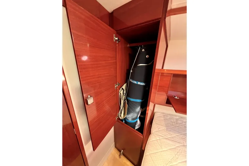 The Jonathan Shepard Yacht Photos Pics Cabin storage on 2006 Hanse 461e yacht with North Sails equipment.