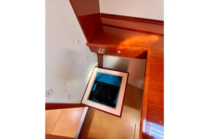 The Jonathan Shepard Yacht Photos Pics Wooden interior storage compartment on a 2006 Hanse 461e yacht.