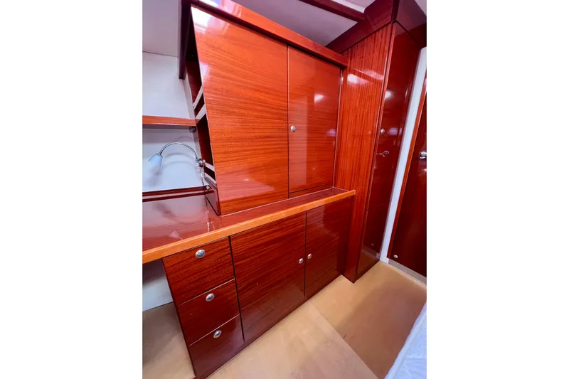 The Jonathan Shepard Yacht Photos Pics Luxurious wooden cabinetry inside a 2006 Hanse 461e yacht interior.