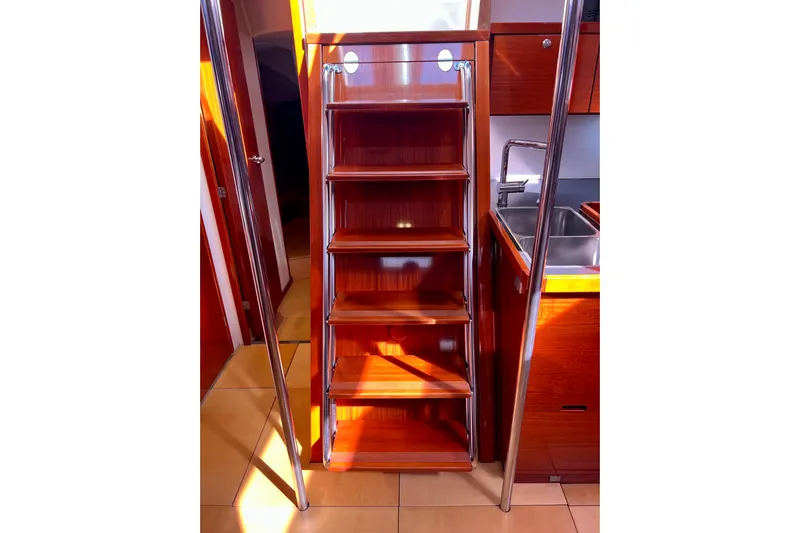 The Jonathan Shepard Yacht Photos Pics Wooden interior stairs on a 2006 Hanse 461e yacht, leading to the deck.