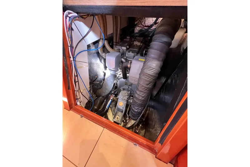 The Jonathan Shepard Yacht Photos Pics Engine compartment of a 2006 Hanse 461e sailboat, showing wiring and components.