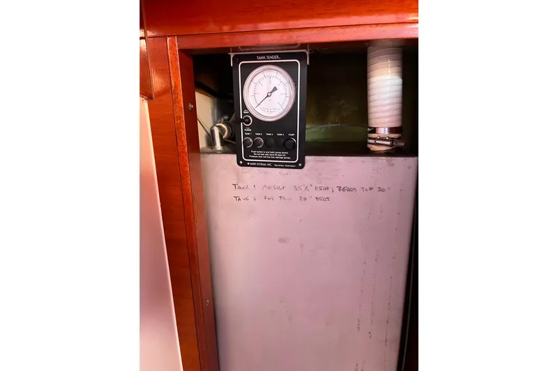 The Jonathan Shepard Yacht Photos Pics Tank gauge and panel inside 2006 Hanse 461e yacht, showing measurements and notes.