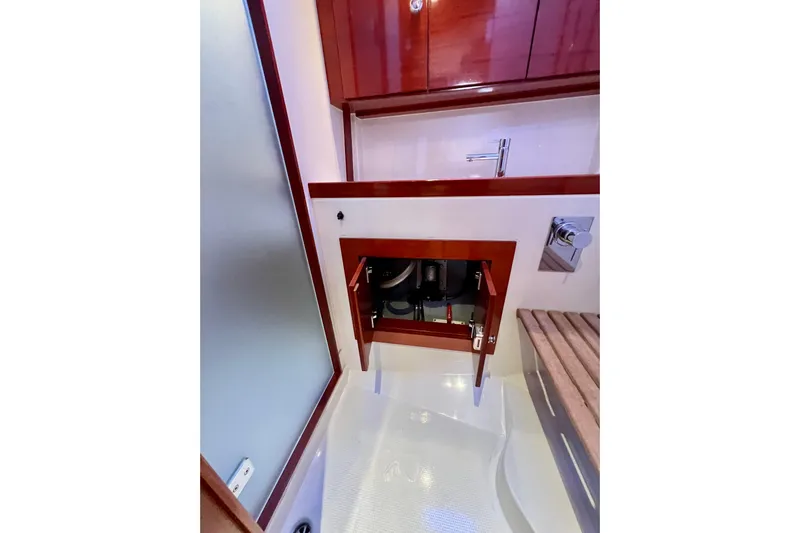 The Jonathan Shepard Yacht Photos Pics Interior of 2006 Hanse 461e yacht showing bathroom storage and fixtures.