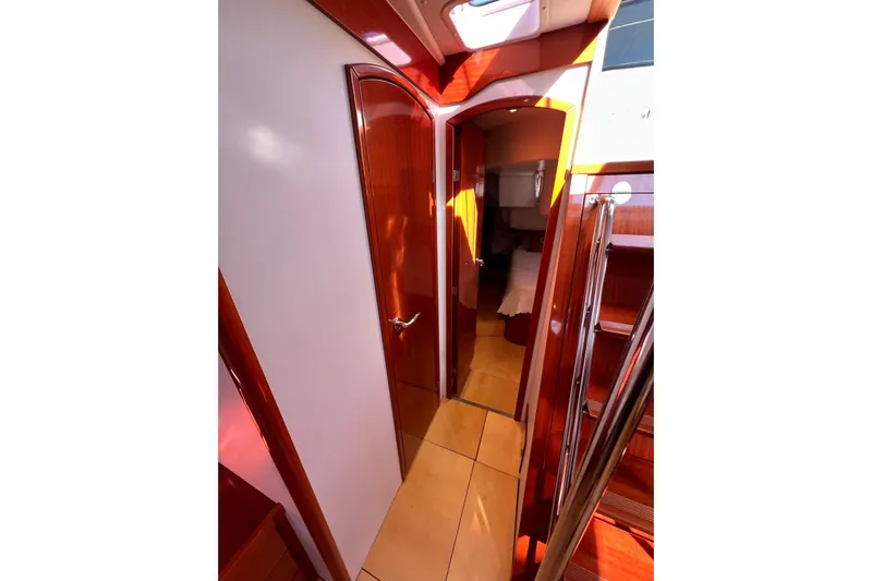 The Jonathan Shepard Yacht Photos Pics Interior of 2006 Hanse 461e yacht, featuring polished wood and modern design elements.